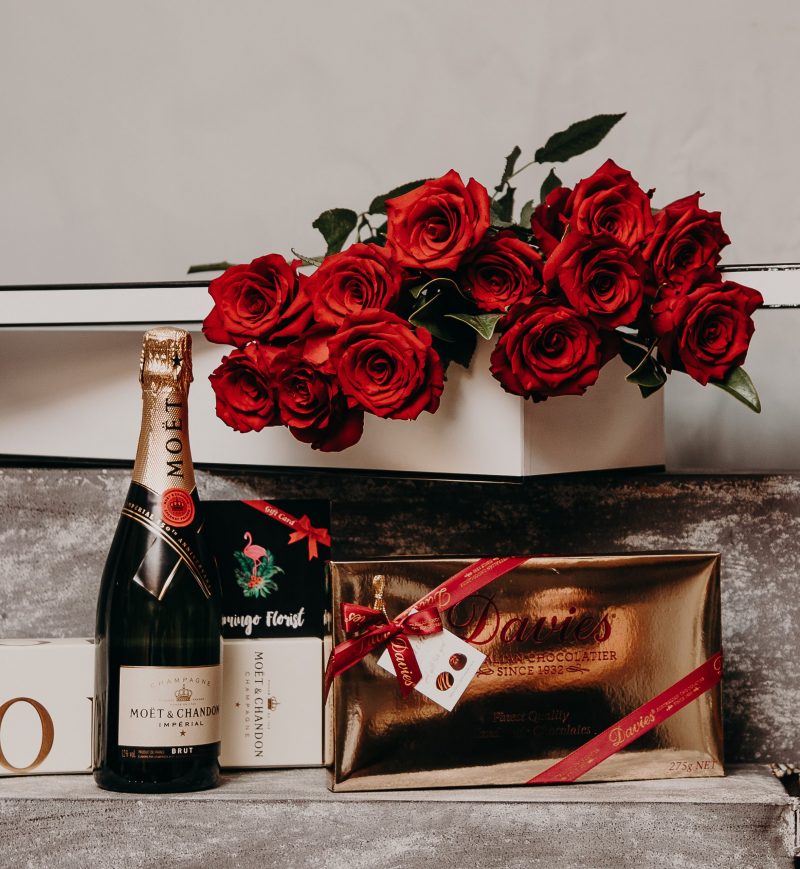 12 Red roses with Moet & Chandon 750ml & Davies Chocolates 275gms